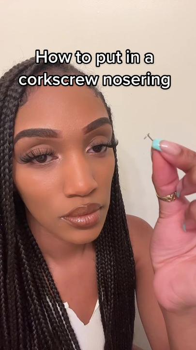 How to Put a Corkscrew Nose Piercing in