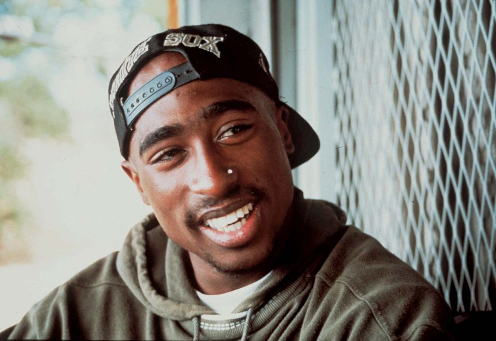 What Side was Tupac'S Piercing on